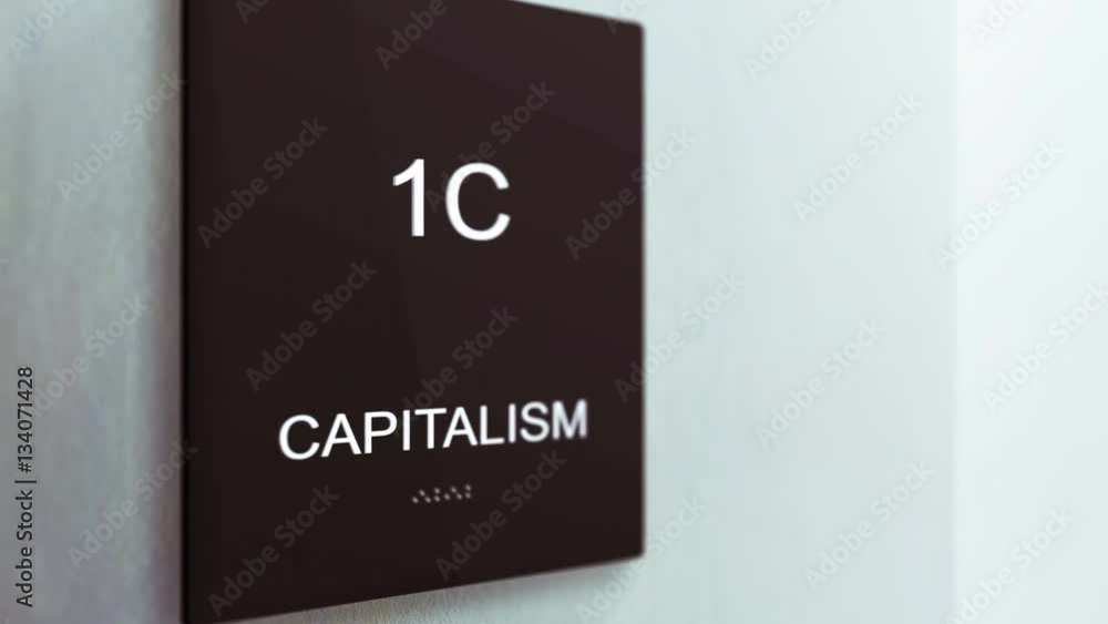 Capitalism Corporate Sign in an ambient modern Office setting Capitalism Corporate Sign in an ambient modern Office setting