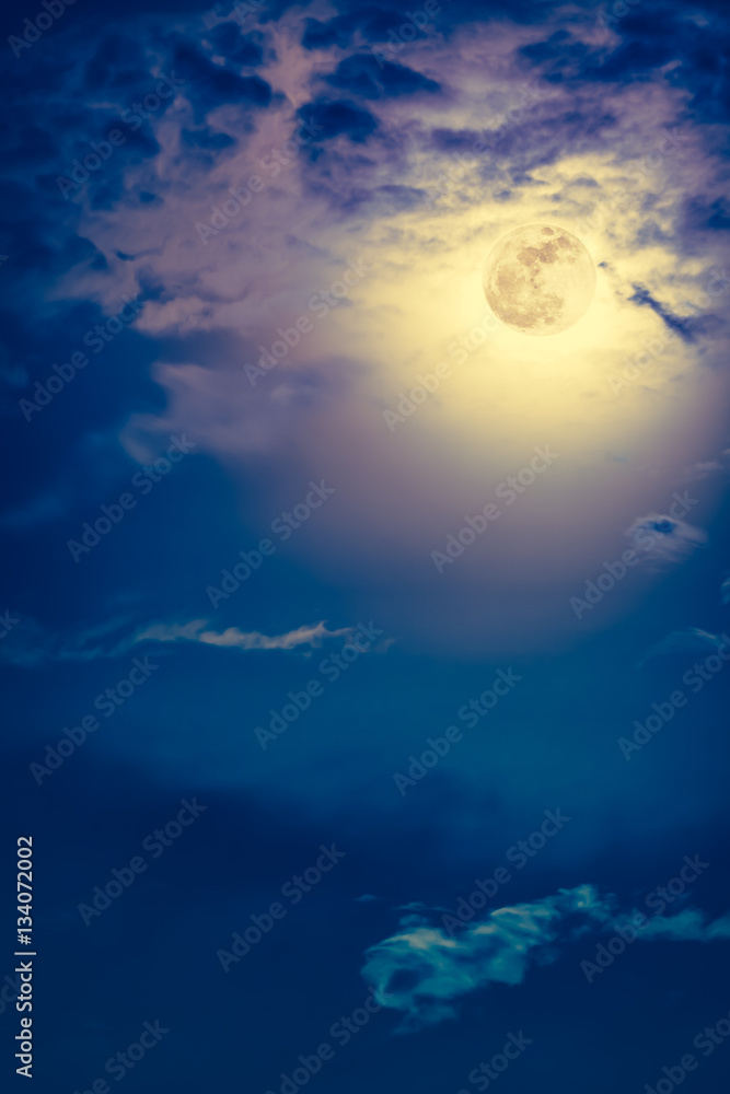 Nighttime sky with clouds and bright full moon with shiny. Nighttime sky with clouds and bright full moon with shiny.