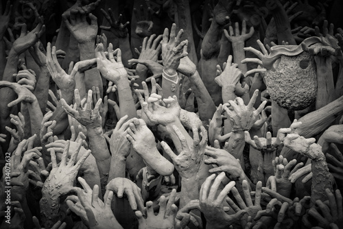 Hands from hell at Wat Rong Khun. Chiangrai province, Thailand. Filter effect style 