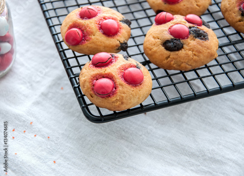 Homemade shortbread cookies with red candies photo