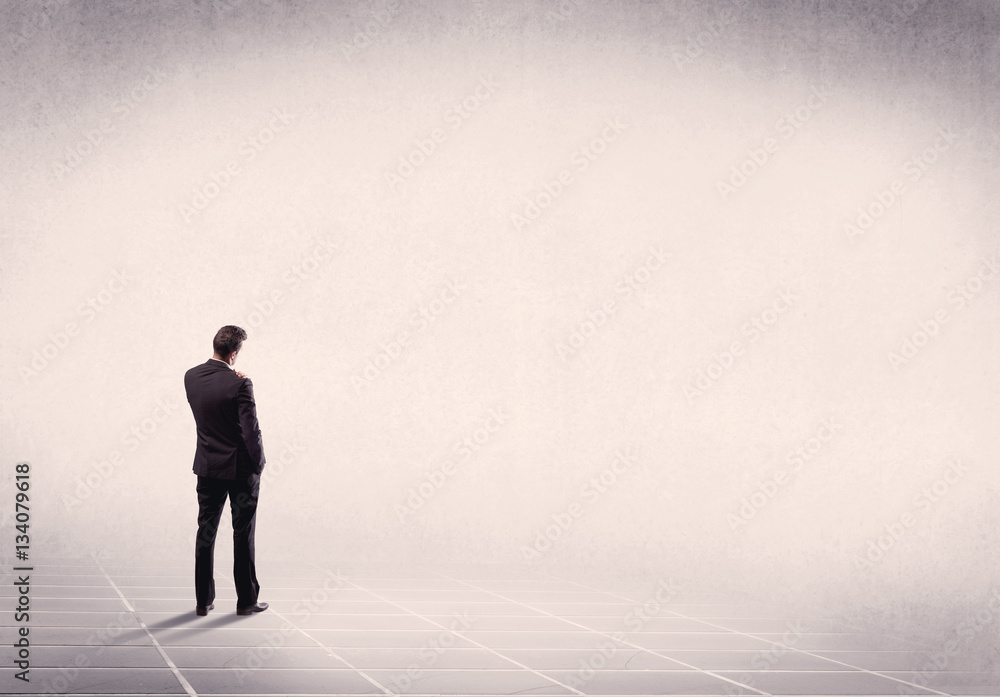 Business person standing in empty space Business person standing in empty space
