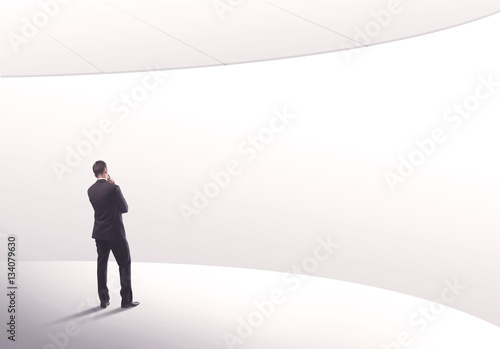 Salesman standing with his back concept