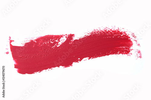 Red color lipstick stroke on white