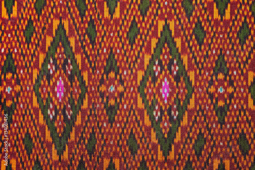 colorful thai silk handcraft peruvian style rug surface old vintage torn conservation Made from natural materials Chemical free close up silk background silk texture