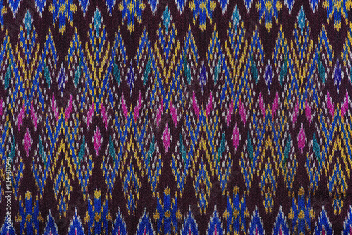 colorful thai silk handcraft peruvian style rug surface old vintage torn conservation Made from natural materials Chemical free close up silk background silk texture