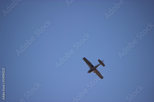 airplane in the ble sky photo