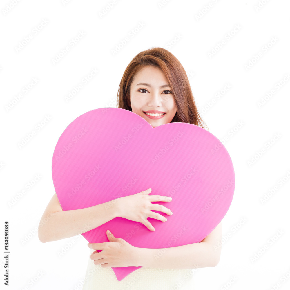 Beautiful woman in love and holding heart shape Beautiful woman in love and holding heart shape