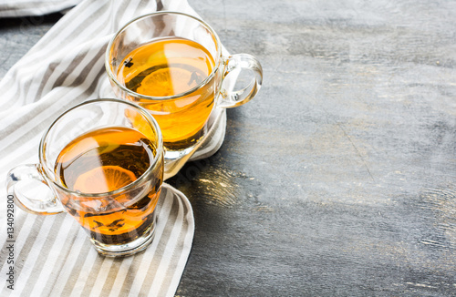 Glass of tea with lemon photo