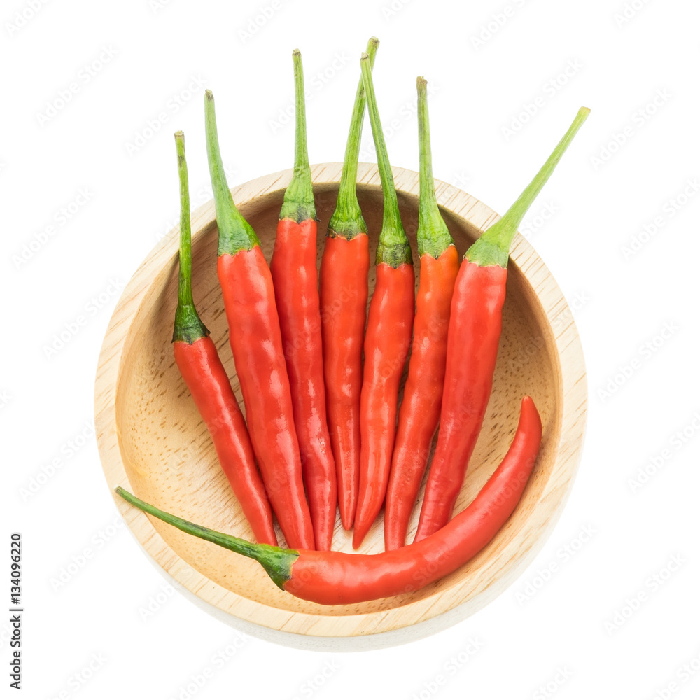 Red bird chili in wooden cup isolated on white background. Red bird chili in wooden cup isolated on white background.