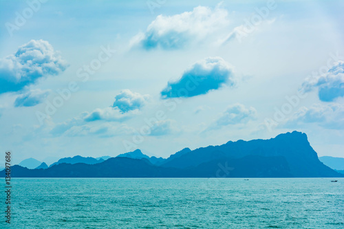 Blue sea and a moving reflection of sunlight