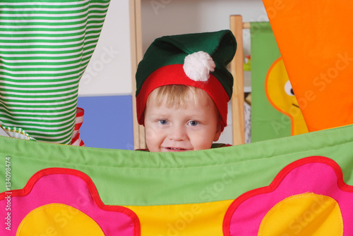 Little boy playing and learning in preschool