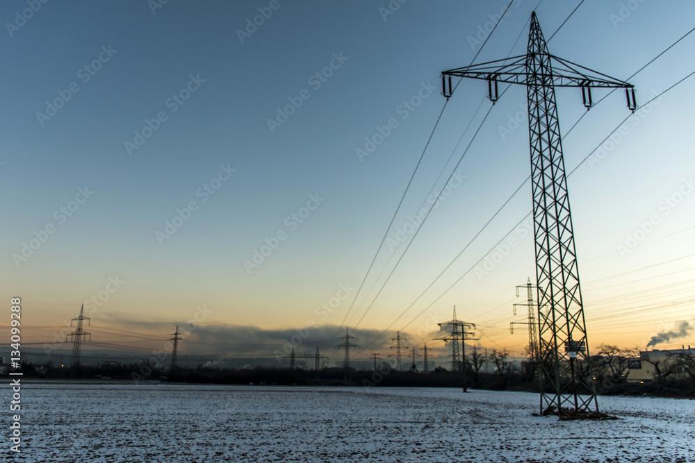 Winter electric power tower landscape Snow white sunset sunrise dawn