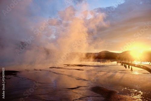 Grand Prismatic Spring in Yellowstone at sunset. Yellowstone National Park. Midway Geyser Basin. Jackson Hole. Wyoming. United States. 