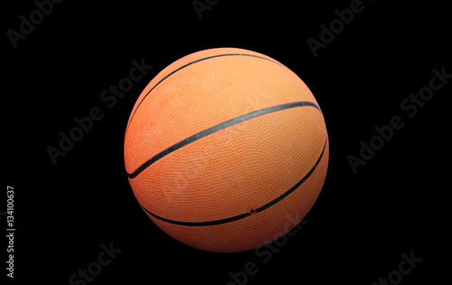Basketball isolated on black background with shadow © zilvergolf