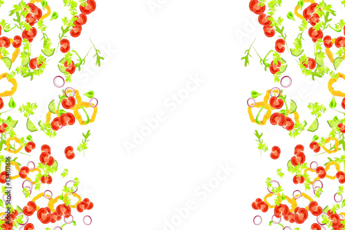 frame of fresh salad ingredients falling down on white background, mediterranean diet and nutrition with tomato,salad,pepper,onion,cucumbers and rocket salad