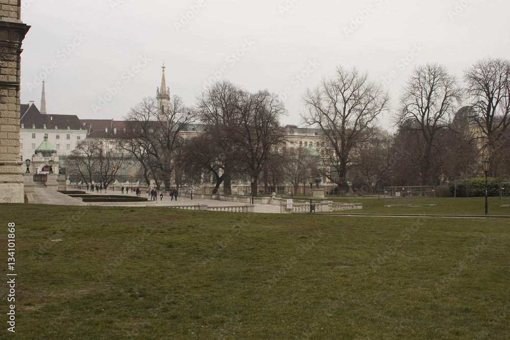 Burggarten park in Vienna in winter season, with few people around Burggarten park in Vienna in winter season, with few people around