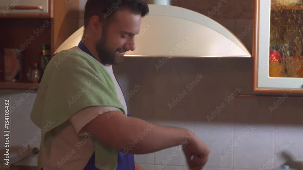 a man cooks in the kitchen a man cooks in the kitchen