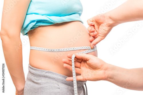 a woman with a big belly on reception at the gynecologist obstet
