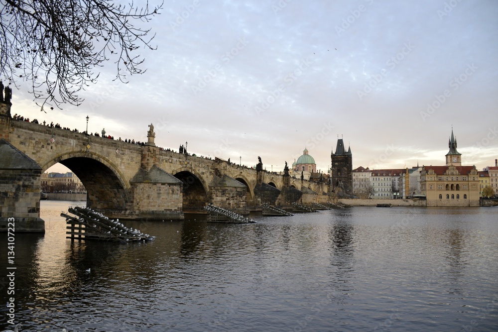 Architecture from Charles bridge in Prague with cloudy sky