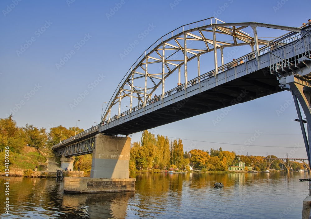 Pedestrian bridge over the Dnieper river. The bridge in Dnepropetrovsk Pedestrian bridge over the Dnieper river. The bridge in Dnepropetrovsk