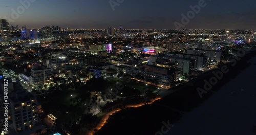 Wallpaper Mural Aerial drone footage of Miami Beach at night illuminated city Torontodigital.ca