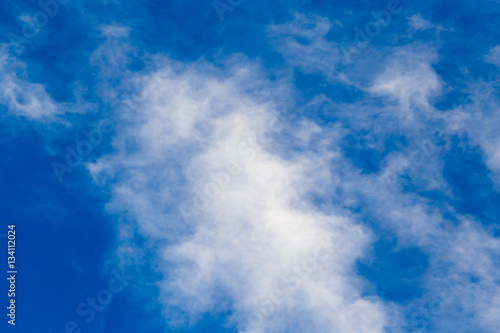 clouds in the blue sky as background © schankz