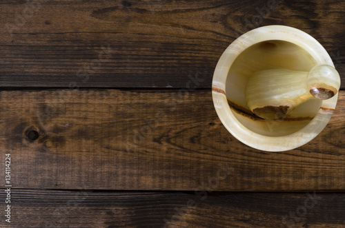 onyx Mortar and Pestle on wooden Background