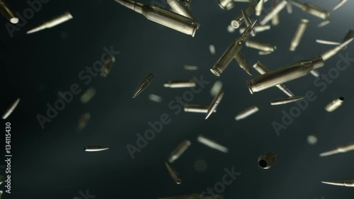 Bullets flight. High quality super slow motion bullets flight in dark space. photo