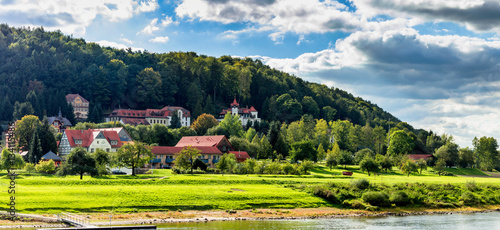 Majestic small resort town Rathen in the gorgeous rocks of Saxony Switzerland and beautiful river Elbe