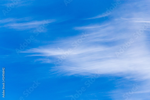 clouds in the blue sky as background © schankz