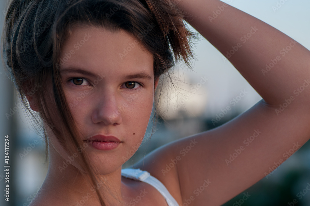 Young, teenage girl's portrait with hair up Young, teenage girl's portrait with hair up