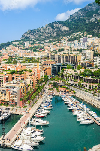 Monte Carlo harbour city panorama. View of luxury yachts and apartments in harbor of Monaco