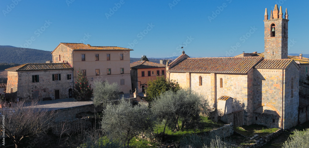 Panoramic foreshortening of Monteriggioni with church of Santa Maria Assunta, Siena district, Tuscany, Italy Panoramic foreshortening of Monteriggioni with church of Santa Maria Assunta, Siena district, Tuscany, Italy