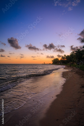 View of a beach at Noumea, New Caledonia during sunset