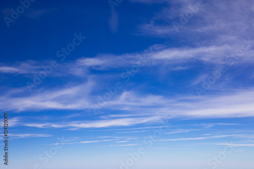 blue sky background with tiny