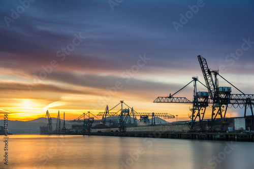 sunrise view to Bilbao industrial cranes  spain