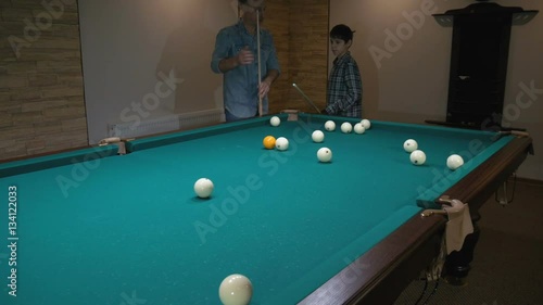 Wallpaper Mural Russian billiards. Father teaches son to play pool Torontodigital.ca