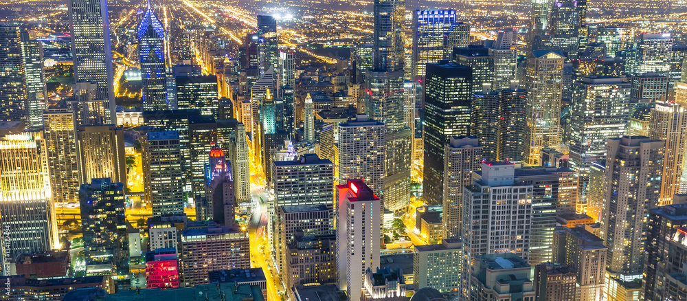 Fototapeta premium Illuminated skyscraper buildings, night view