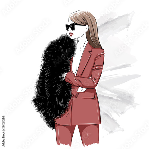 Stylish woman in fur and glasses
