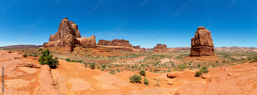 Red stone mountains and valley landscape