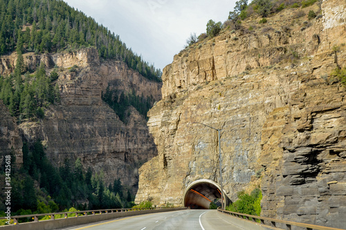 US Interstate 70 (I-70) westbound entering tunnel in Glenwood Canyon 
Garfield county, Glenwood Springs, Colorado, USA photo