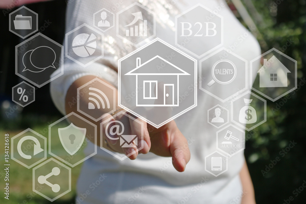 The businessman clicks with web touch home on the touch screen.The concept of finding housing for rent or purchase . The businessman clicks with web touch home on the touch screen.The concept of finding housing for rent or purchase .