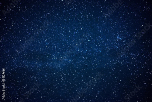 Obraz na plátně Blue dark night sky with many stars