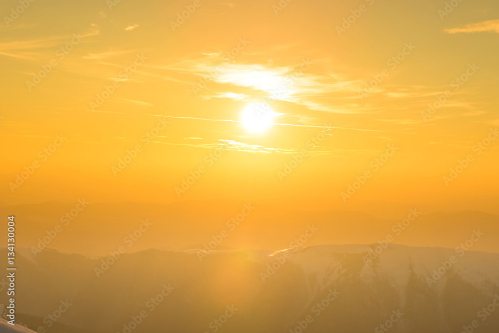 Sunset over hills and mountains