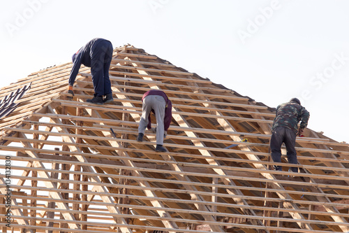 Wallpaper Mural workers working on the roof Torontodigital.ca