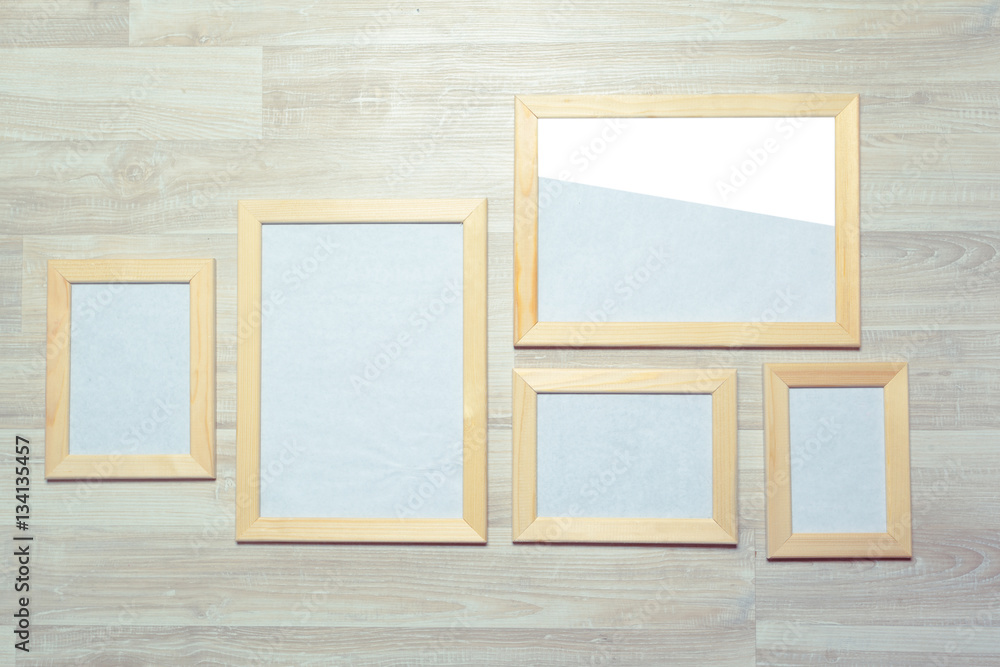 photo frames on the wooden wall photo frames on the wooden wall