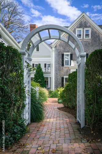 A Trellis or Archway leading to the shared garden area of multi homes on Nantucket Island