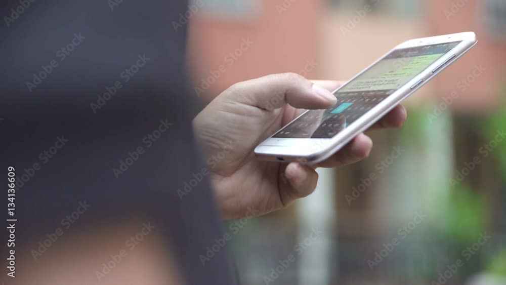 boy's hand chatting on whatsapp boy's hand chatting on whatsapp