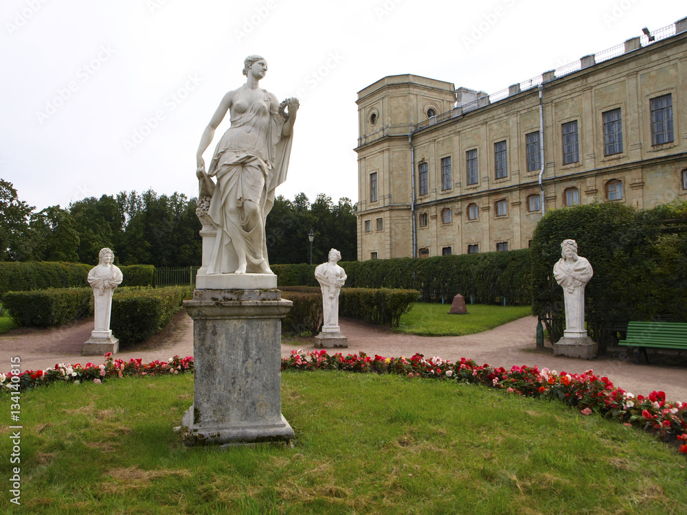 Gatchina park in Saint-Petersburg, Russia with Palace and white statues Gatchina park in Saint-Petersburg, Russia with Palace and white statues