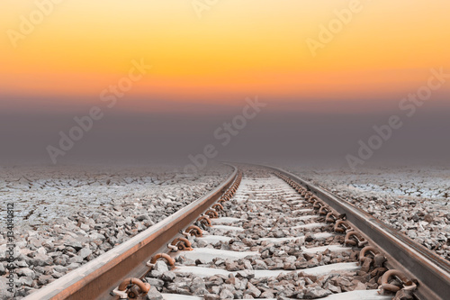 railway in arid area, sunset time